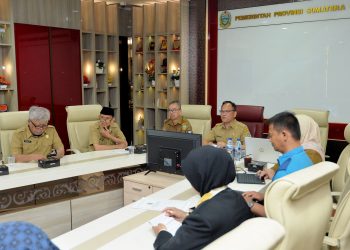 metrodeli/istimewa RAKOR : Plt Kepala Dinas Komunikasi dan Informatika Provinsi Sumut Porman Mahulae mewakili Sekdaprov Sumut Togap Simangunsong membuka dengan resmi Rapat Koordinasi PPID Provinsi Sumut secara daring melalui aplikasi Zoom Meeting di Ruang Sumut Smart Province Lantai 6 Kantor Gubernur Sumut Jalan Diponegoro Kota Medan, Senin 28 Juli 2025.