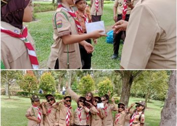 metrodeli/istimewa RAIH JUARA: Pembina Pramuka Siaga CNB Tembung, Nuzhrul Ramadani Sari, bersama peserta didik yang berhasil meraih Juara 1 Lomba Indonesia Raya Tingkat Siaga pada Apel Besar Hari Pramuka ke-64 Kwarcab Deli Serdang di Lubuk Pakam, Selasa 18 November 2025.